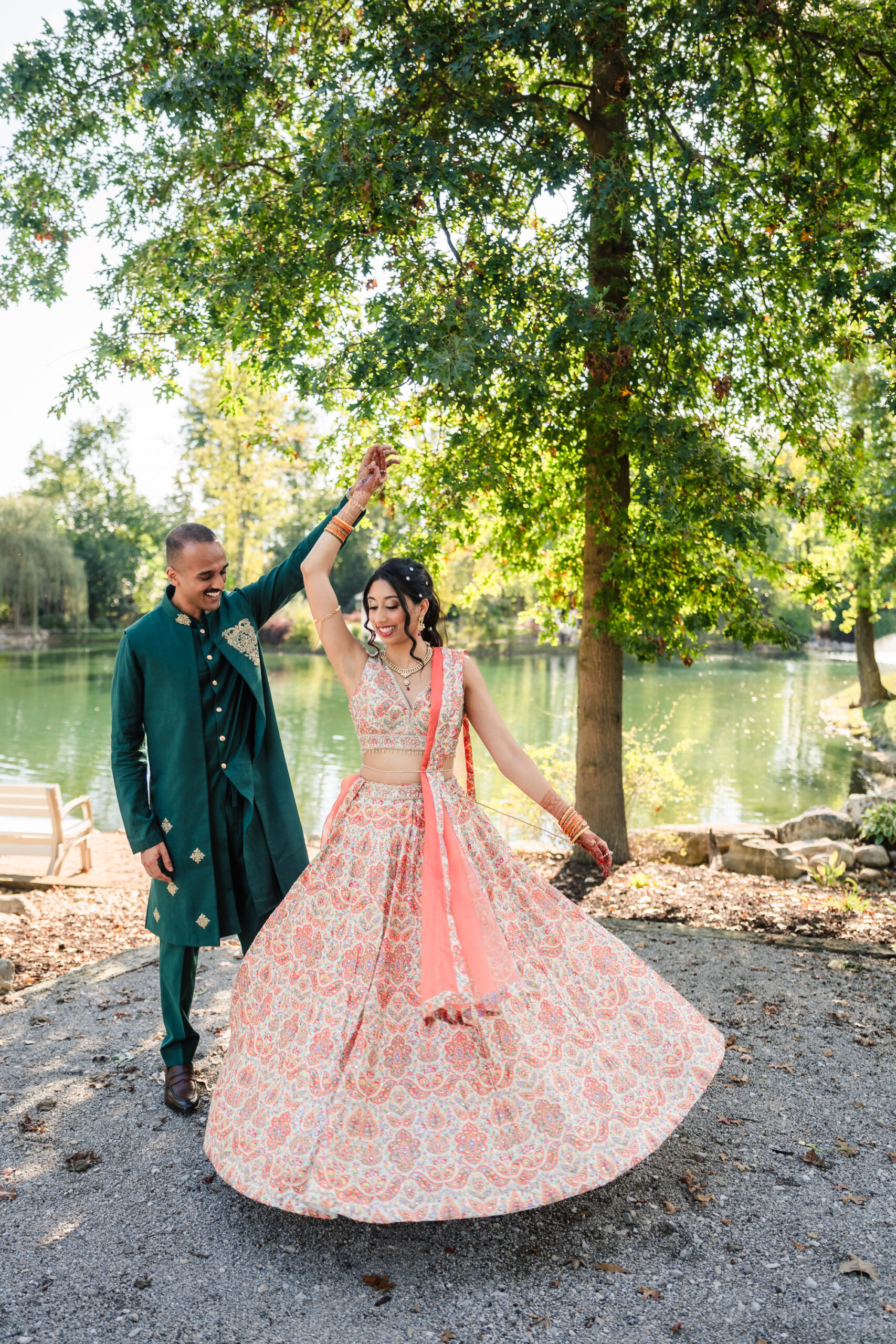 bride and groom at Swan Lake during first look before Sangeet