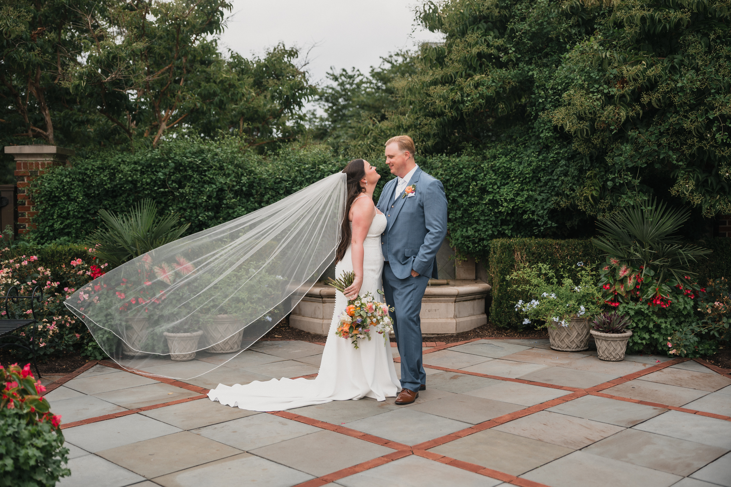newlywed portrait in the formal garden of Franklin Park Conservatory